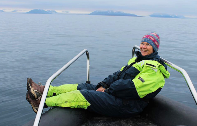 Lise enjoying the Arctic while students sample marine water from Adventfjorden, Svalbard Lise enjoying the Arctic while students sample marine water from Adventfjorden, Svalbard